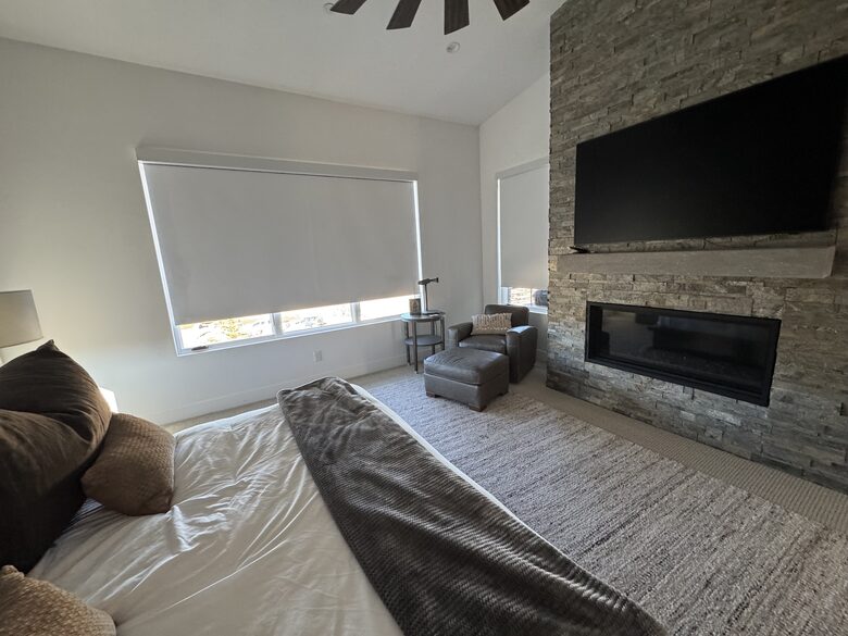 Master Bedroom, automated shades, fireplace, TV