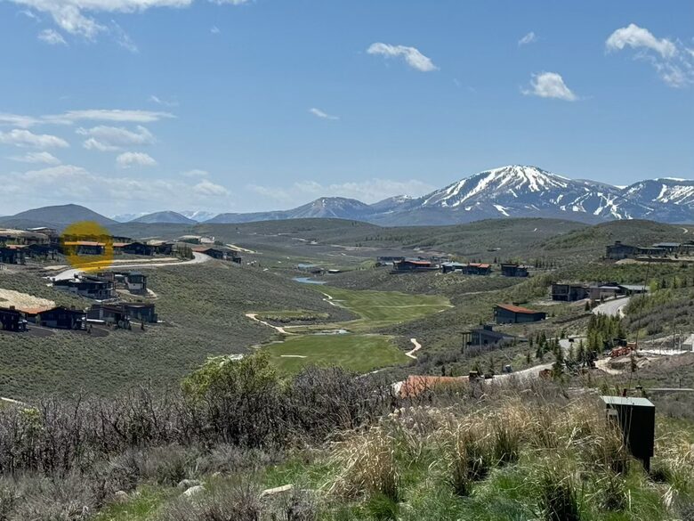 View from nearby, house in yellow on left