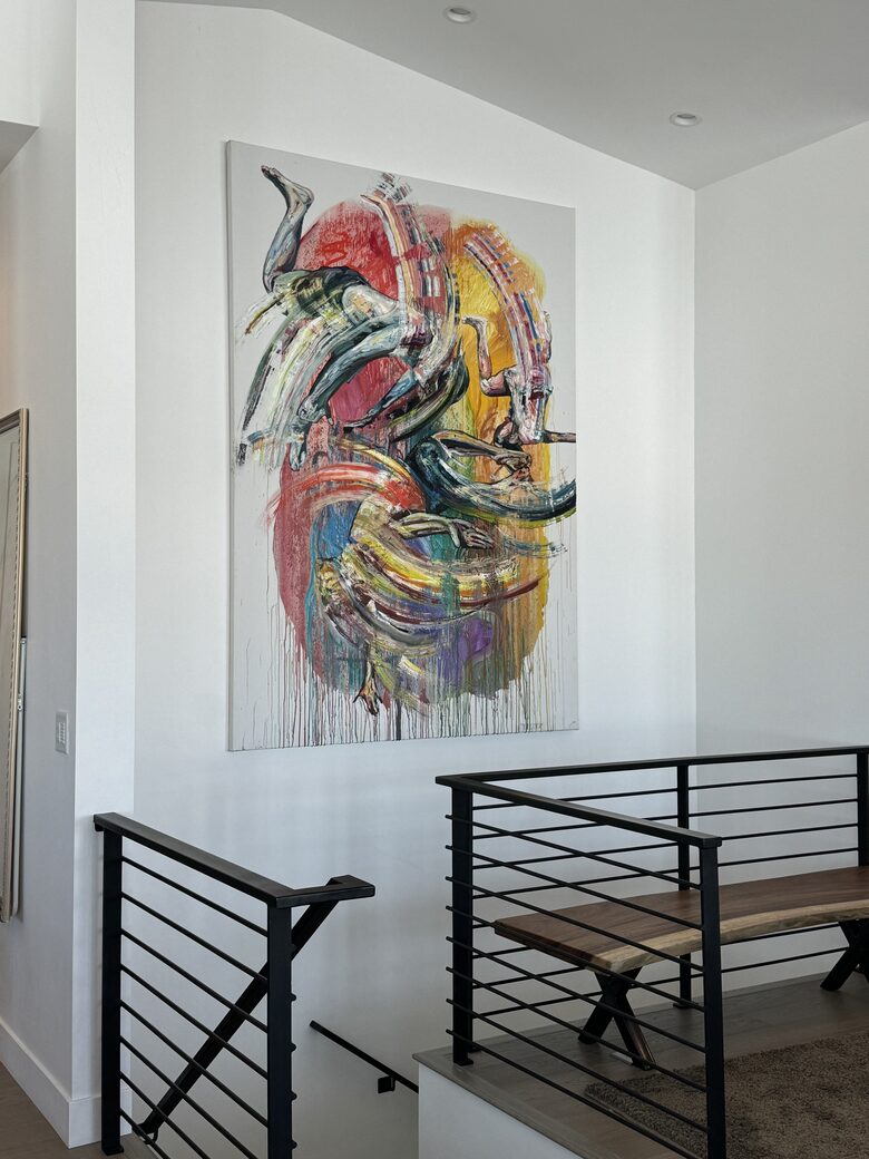 Staircase to lower level with 3 BR, Den, Gym, Office