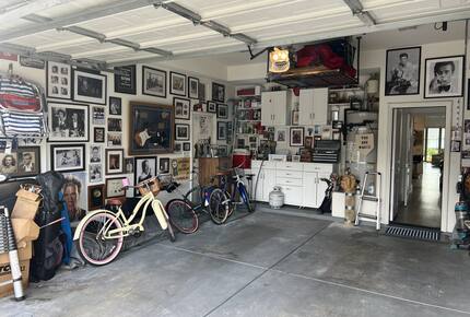 Stocked Garage with one car indoor parking and two outside