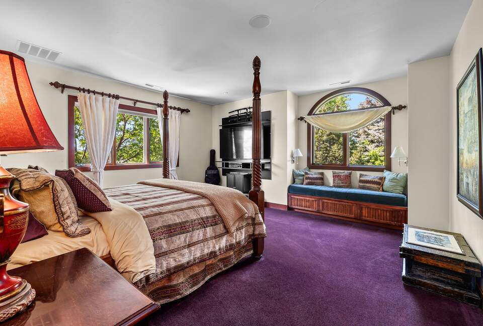 Bedroom attached to the library with king bed