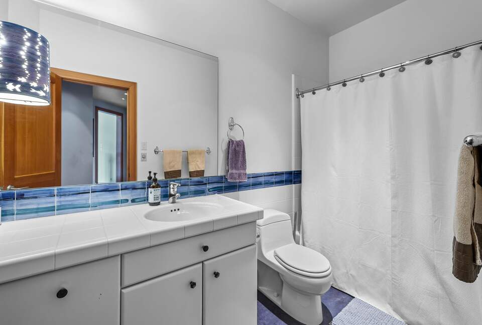 spare bathroom with tub and shower