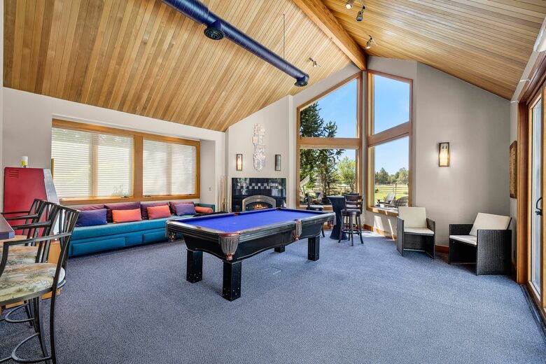 Pool House with fireplace and views of the Three Sisters Mountains