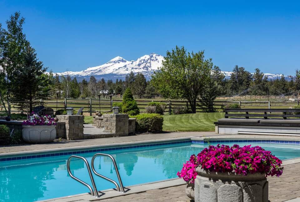 Heated pool with beautiful mountain, horse pasture views