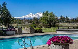 Heated pool with beautiful mountain, horse pasture views