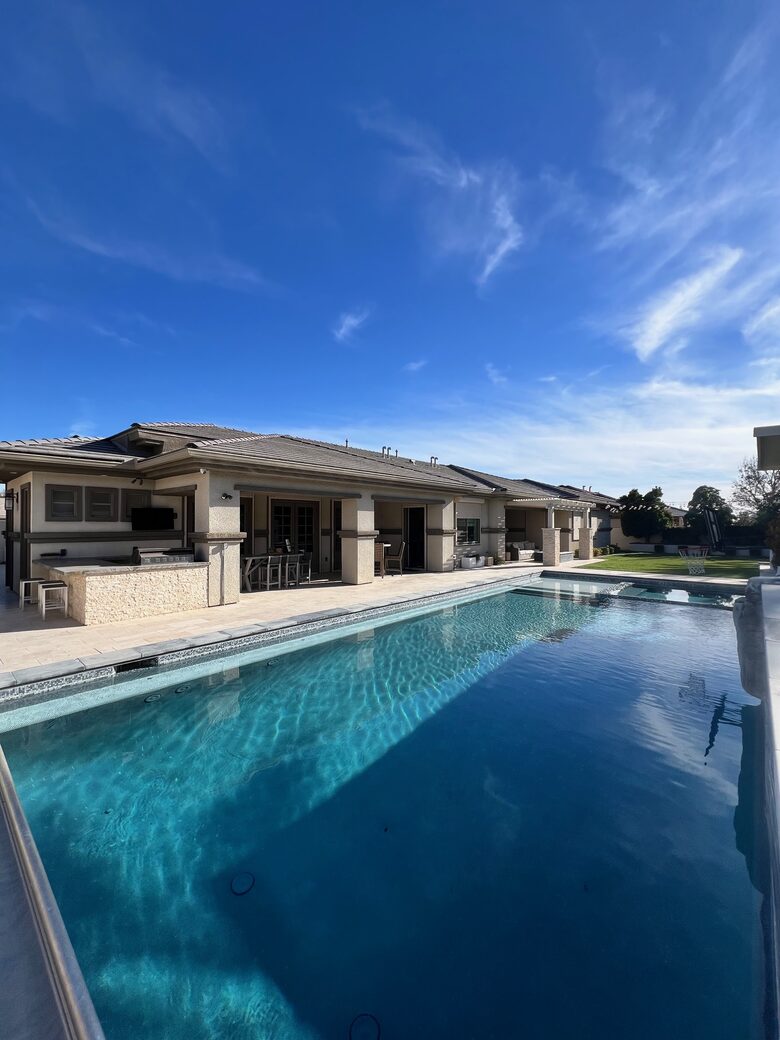 Resort style pool/BBQ with plenty of seating