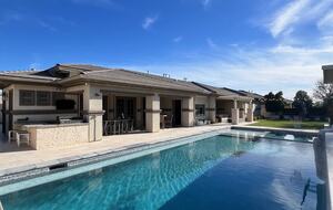 Resort style pool/BBQ with plenty of seating