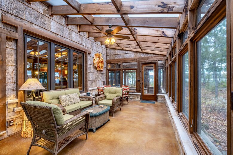 An enclosed porch for relaxing and enjoying the scenery