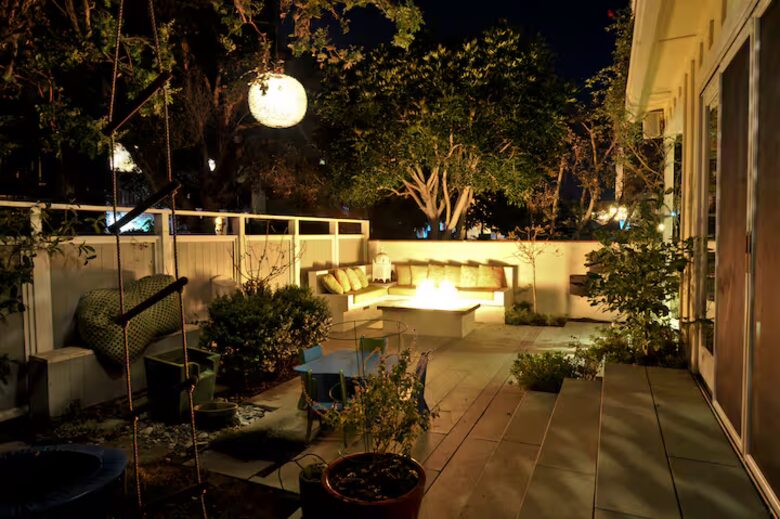 Front Porch with Couch seating, fire pit & additional outdoor couch