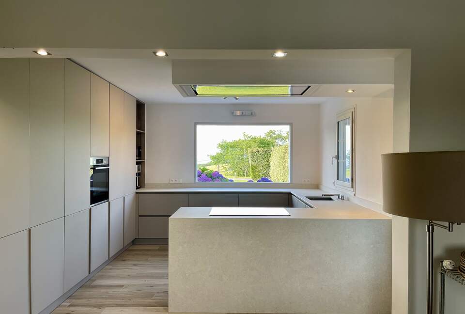 The kitchen with ocean views