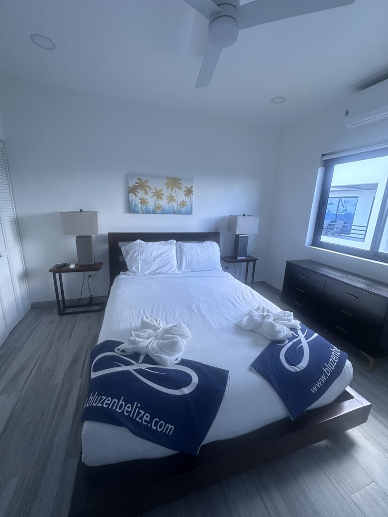 Second bedroom with queen size bed dresser and closet