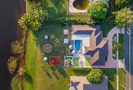 Waterfront Retreat with Pool, Pickleball & Sauna - West Palm Beach, Florida