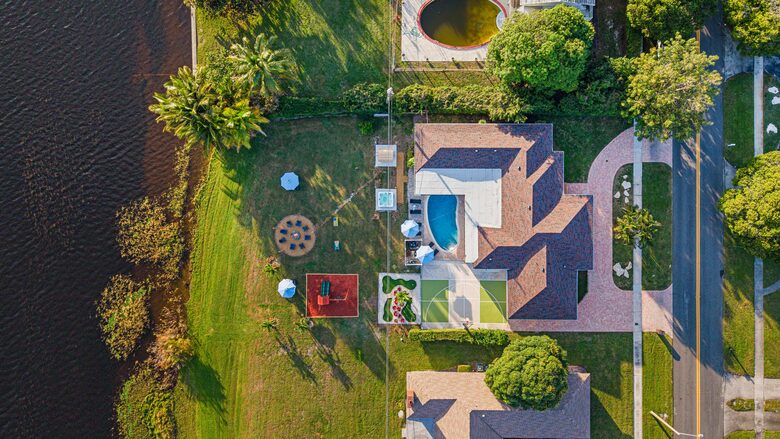 Waterfront Retreat with Pool, Pickleball & Sauna - West Palm Beach, Florida