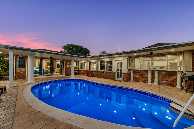 Waterfront Retreat with Pool, Pickleball & Sauna - West Palm Beach, Florida