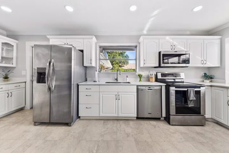 Waterfront Retreat with Pool, Pickleball & Sauna - West Palm Beach, Florida