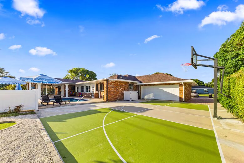 Waterfront Retreat with Pool, Pickleball & Sauna - West Palm Beach, Florida