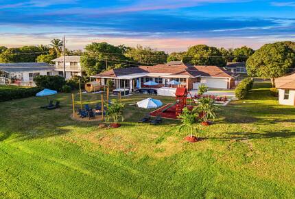 Waterfront Retreat with Pool, Pickleball & Sauna - West Palm Beach, Florida