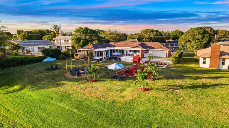 Waterfront Retreat with Pool, Pickleball & Sauna - West Palm Beach, Florida