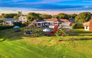 Waterfront Retreat with Pool, Pickleball & Sauna - West Palm Beach, Florida