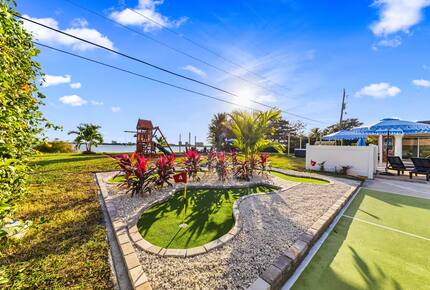 Waterfront Retreat with Pool, Pickleball & Sauna - West Palm Beach, Florida