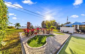 Waterfront Retreat with Pool, Pickleball & Sauna - West Palm Beach, Florida