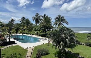 View from terrace to pool and beach