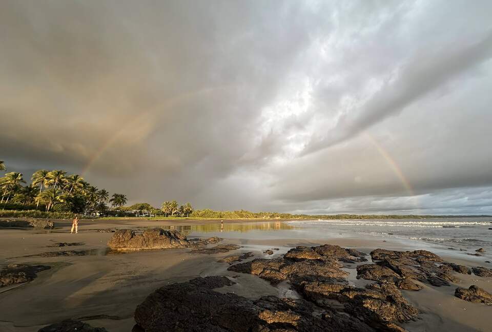 The beach view South with a rainbow