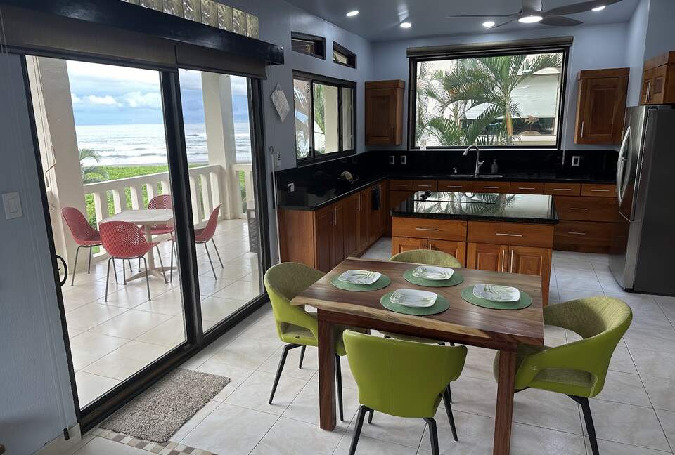 View of the ocean from the living, dining, and kitchen area