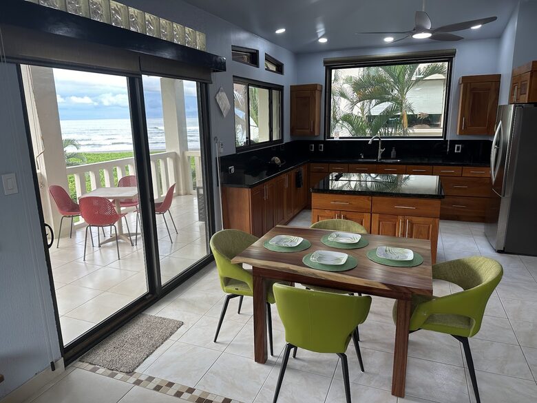 View of the ocean from the living, dining, and kitchen area