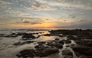The beach view West with a sunset