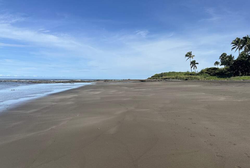 The beach in front of the property, looking North
