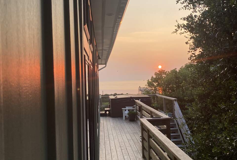 Hot Tub overlooking waterfront sunset
