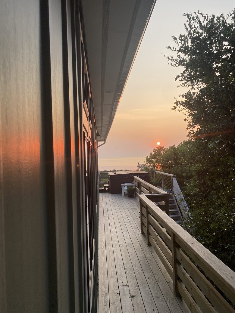 Hot Tub overlooking waterfront sunset