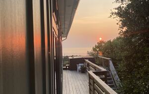 Hot Tub overlooking waterfront sunset