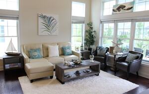 Family room with ample seating and large TV with streaming device