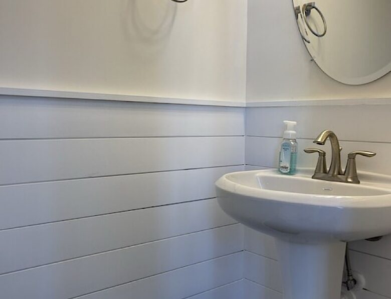 Powder room on main floor in foyer area