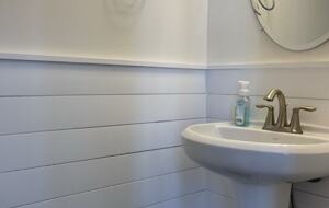 Powder room on main floor in foyer area