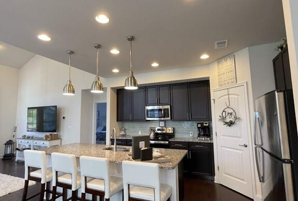 Kitchen with counter stools, large walk in pantry, well equipped