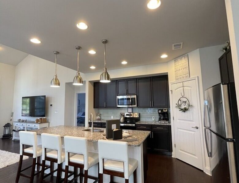 Kitchen with counter stools, large walk in pantry, well equipped