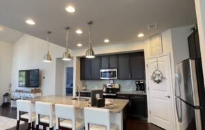 Kitchen with counter stools, large walk in pantry, well equipped