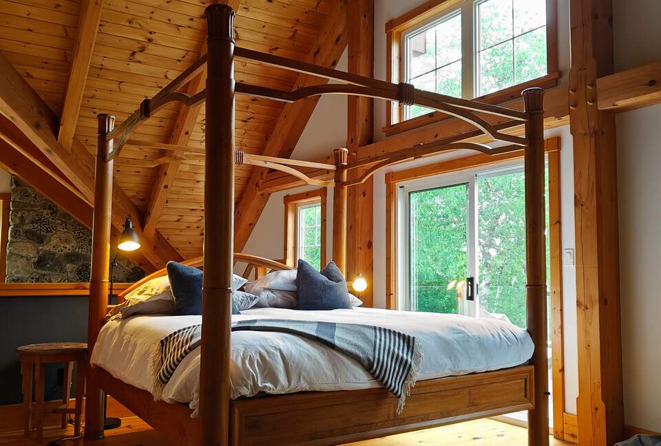 Primary Suite with lake views and private balcony