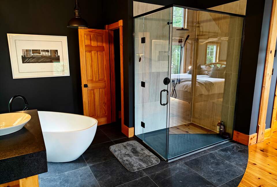 Ensuite open bathroom with large soaker tub, walkin shower