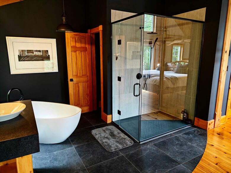 Ensuite open bathroom with large soaker tub, walkin shower