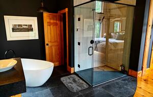 Ensuite open bathroom with large soaker tub, walkin shower