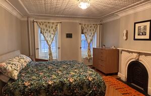 King bedroom with fireplace en suite bathroom 3 closets