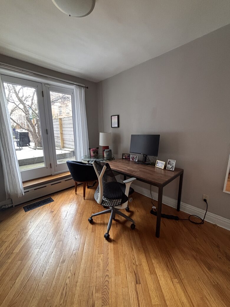 Home office and workout room with backyard access