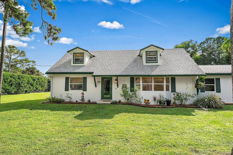 Resort-Style Jupiter Retreat on 1.25 Acres - Jupiter, Florida