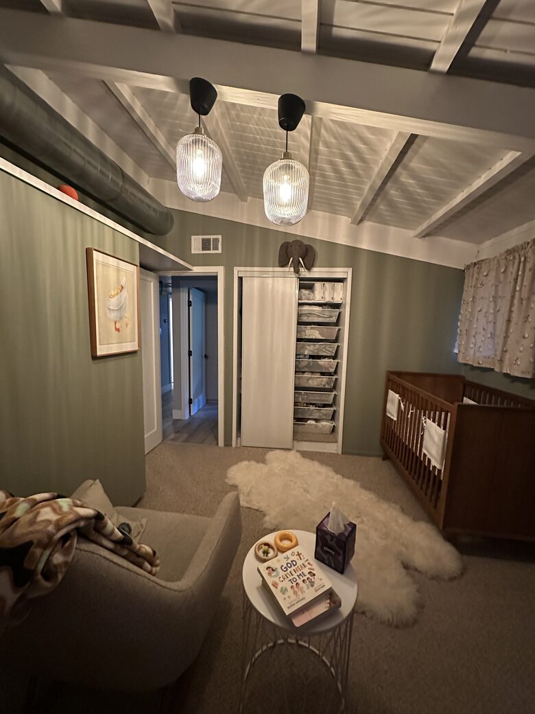 Nursery with Crib, Rocker, and Changing Table