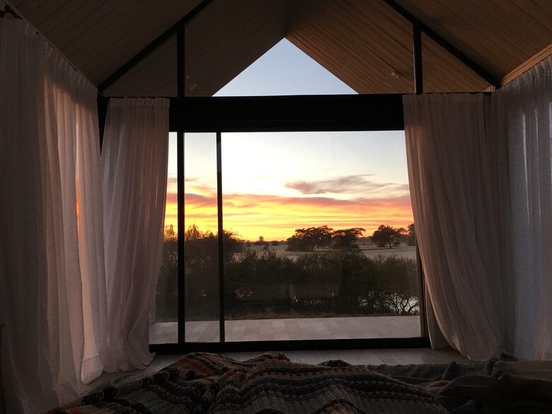 Master bedroom sunrise view from bed