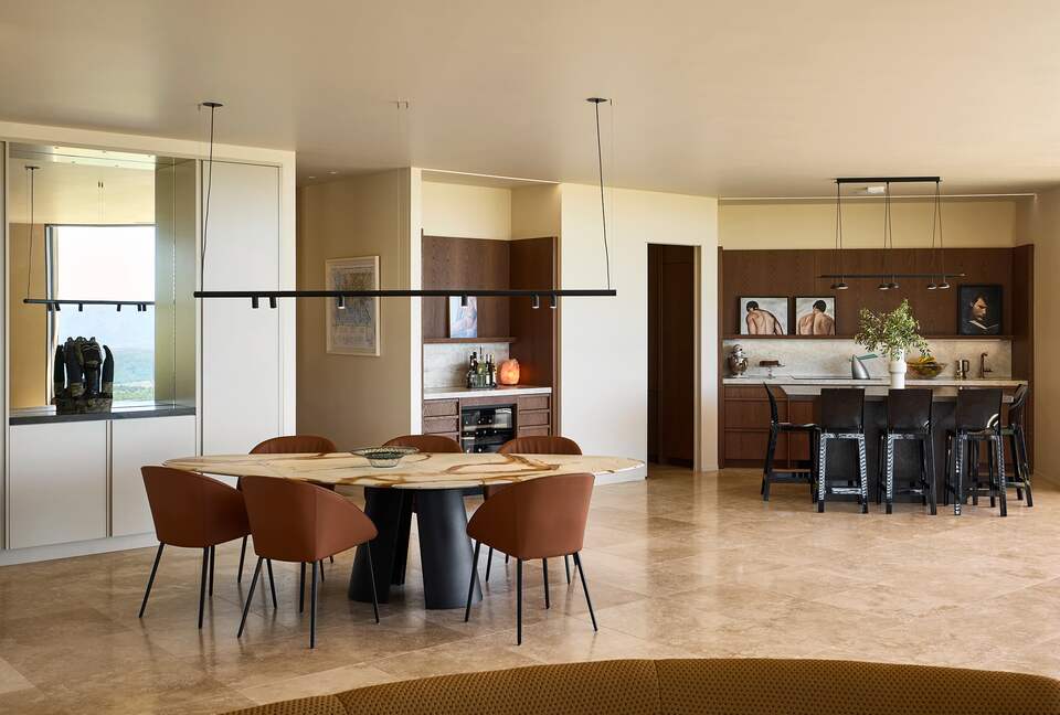 Dining room and kitchen beyond